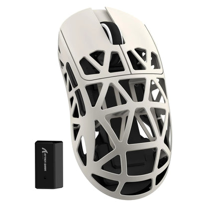 White gaming mouse with black accents and a wireless receiver on a white background