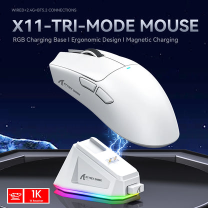White gaming mouse with RGB charging base on a dark background